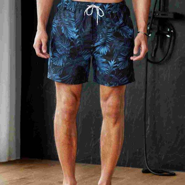 Manfinity Swimmode شورت سباحة ترانك بطباعة استوائية رباط خصر للرجال